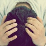 Divan - head in hands